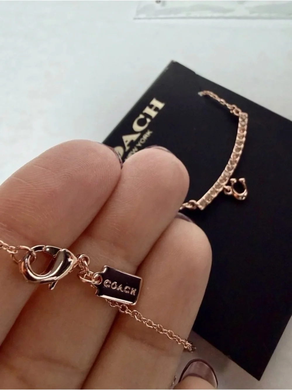 Coach necklace rose